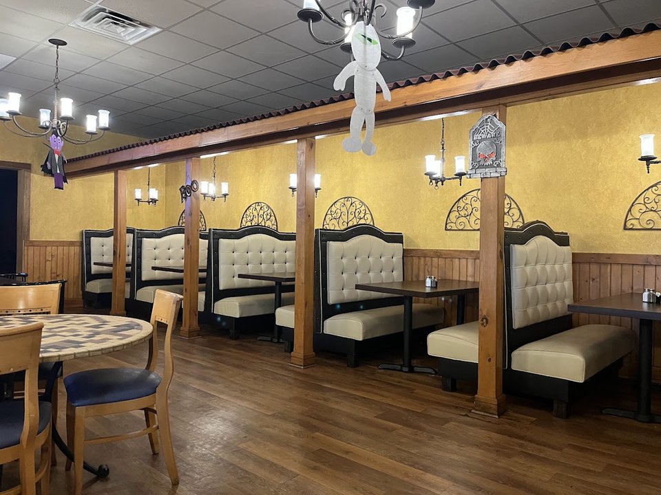Mexican restaurant dining room with simple table settings.